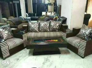 Designer center table with 5 seater sofa set at
