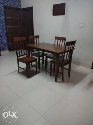 Four seater dining table in perfect condition.Two