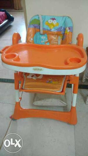 Lilliput high chair...washable...foldable...height