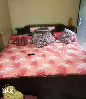 Need to sold double bed with boxes teak wood at