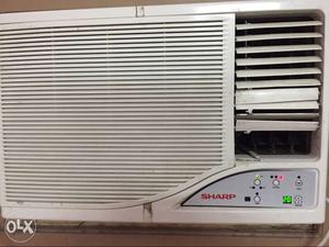 White Sharp Window Type Air Conditioner along with Everest