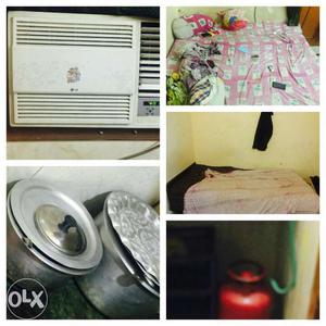 White Window-type Air Conditioner, Pink Bed Linen And