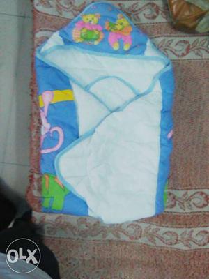 Baby's White And Blue Swaddle Blanket