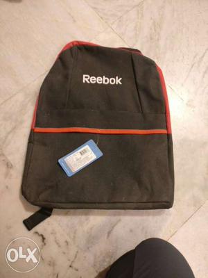 Black And Orange Reebok Backpack