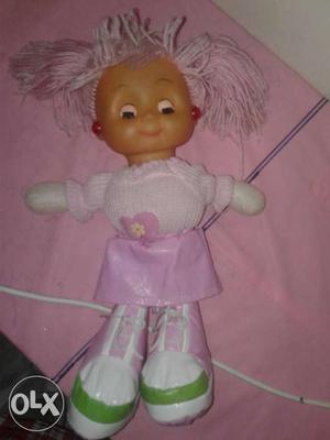Cute little pink singing doll. brand new.