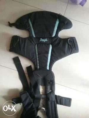 Snugli brand baby carrier in a very good