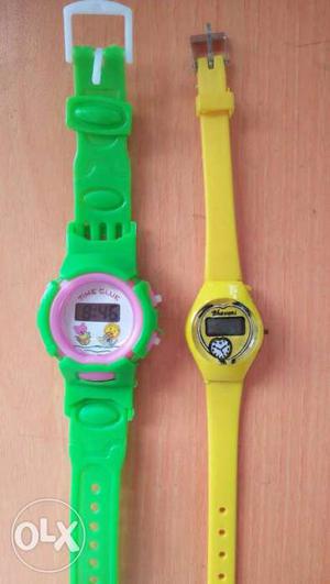 Two Green And Yellow Digital Watch Rubber Bands