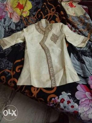 White And Brown Traditional Suit