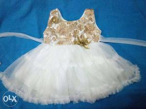 White and golden baby girl dress suitable for 3