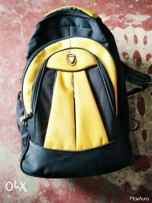 Yellow And Black Fabric Backpack