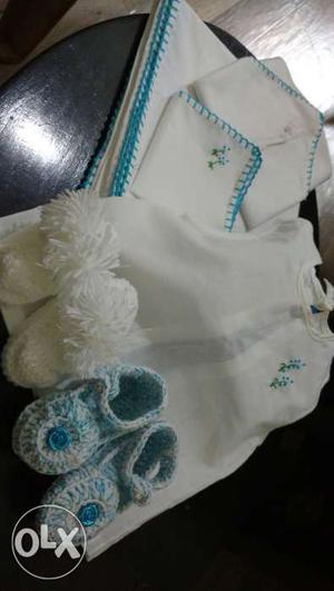 Brand new set of a dress, nappy, wrapper,