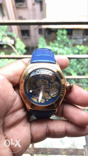 Gold Skeleton Watch With Blue Strap