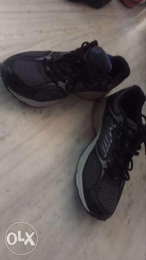 Pair Of Black Fila Running Shoes