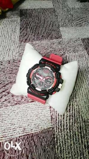 Round Black Casio G-Shock Chronograph Watch With Red Strap