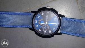 Round Black Chronograph Watch With Blue Bracelet