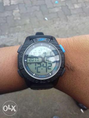 Round Digital Watch With Black Rubber Bracelet