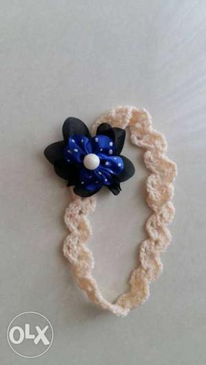 Baby girl knitted floral hairband, age 0 - 2