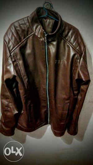 Brown leather jacket. In good condition. inside woolen