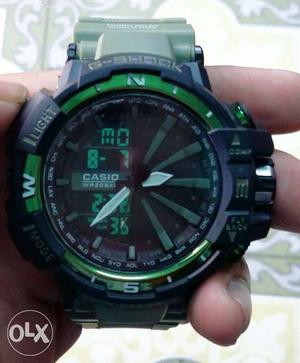 Green And Black G-shock Digital Watch