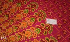 Pink, Red, Green, And Orange Textile