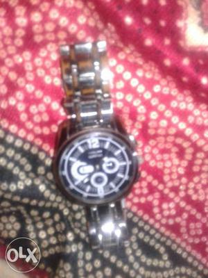 Round Black Chronograph Watch With Silver Rivet Link