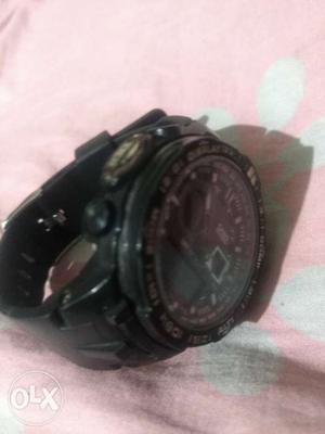 Round Black Frame Digital Watch With Black Rubber Strap