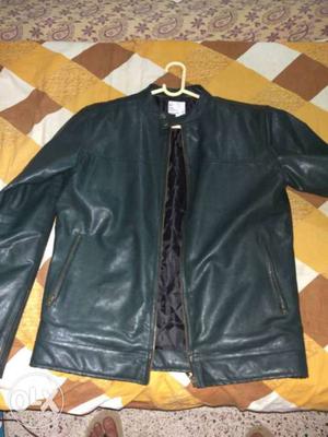 Unused leather jacket medium size dark green color