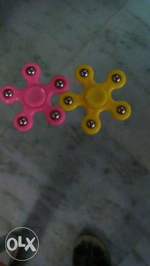 2 sweety Spinner Pink and yellow brand new