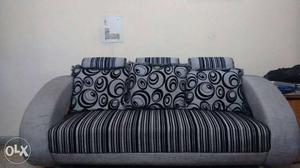 A 3 seater sofa along with 2 one seater sofa.