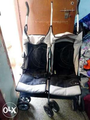 Baby's White And Black Twin Stroller
