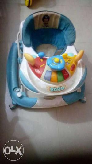 Baby's White And Blue Activity Walker