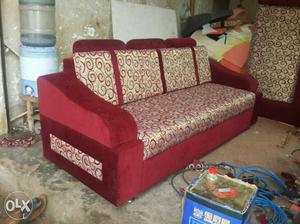 Beige And Red Spiral Padded Sofa
