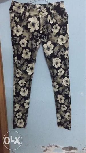 Black, Gray, And Beige Floral Zip Up Jeans