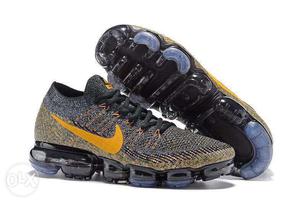Black-and-yellow Nike Running Shoes