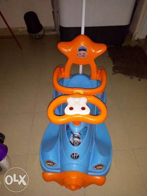 Blue And Orange Push Car
