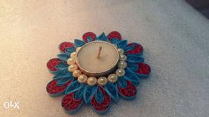 Blue, Red, And White Decorative Candle