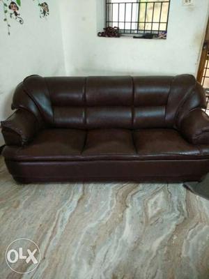 Brown Leather Padded Three-seat Sofa