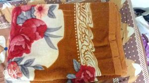Brown, White And Red Floral Print Blanket. If required call