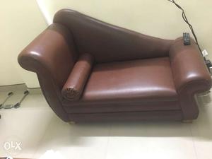 Brown coloured mini sofa