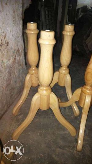 Four Brown Wooden Table Legs