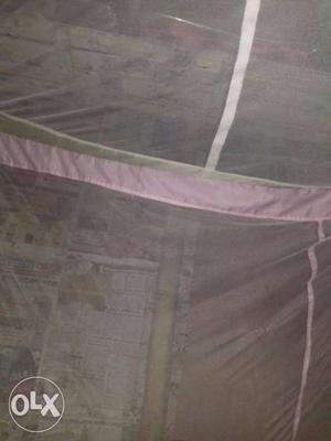 Gray And Pink Mosquito Net