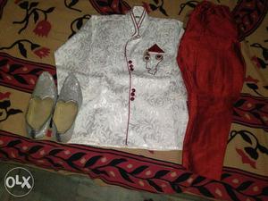 Gray Jutti, White Sherwani And Red Pants