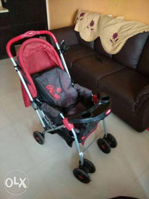 Infant's Gray And Red Stroller