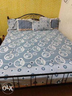 Iron double bed with matress in good condition
