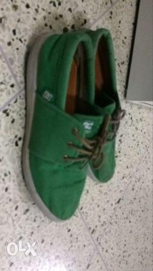 Light green orignal DC shoes with a MRP of .