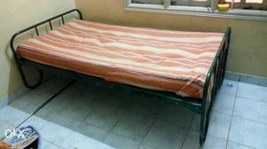 Metal cot with bed & pillow