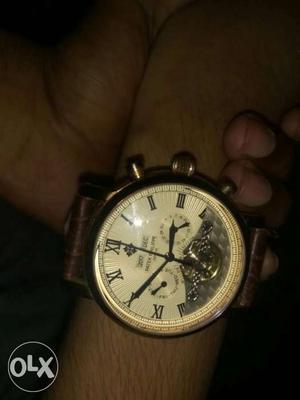 Patek Philippe Round Silver And White Chronograph Watch