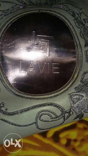 Purple Lavie spacious handbag with 1 main zip and