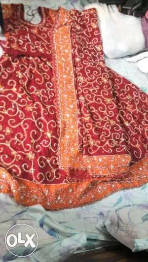 Red And Orange Floral bridal lehnga with heavy work