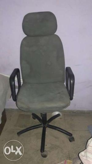 Revolving office chair grey color adjustable